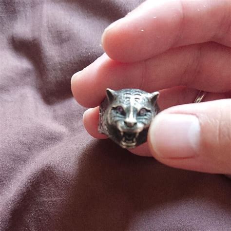 gucci feline ring with purple